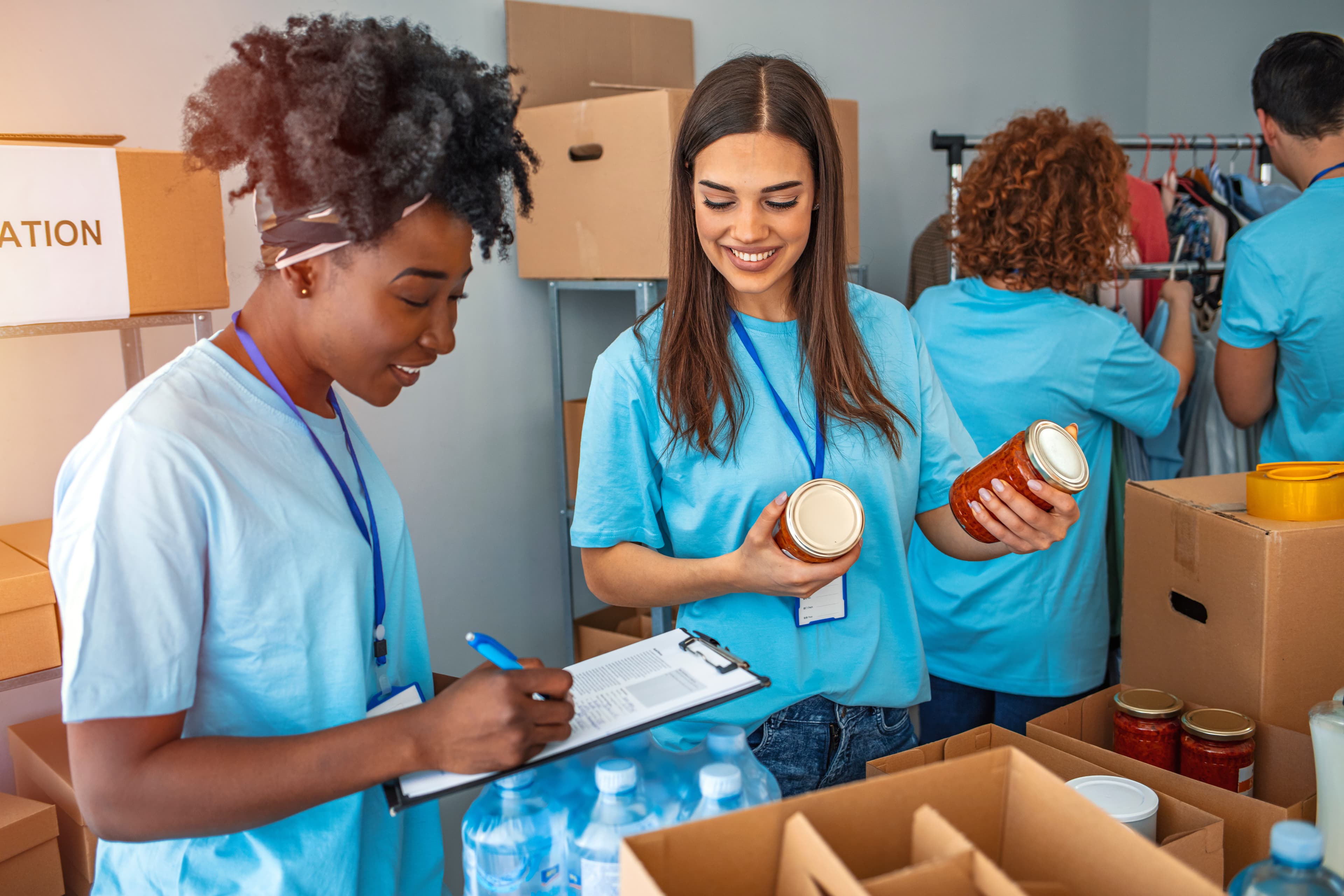 Non-profit industry marketing and technology services - vounteers working in a food bank